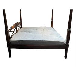 Georgian design Indian sheesham hardwood framed four poster bed, lattice slats to the top supported by reeded cylindrical and octagonal column uprights, the pierced stepped headboard carved with floral motifs, with associated mattress