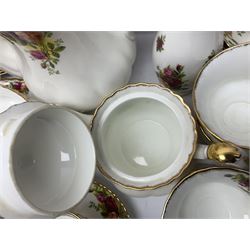 Royal Albert Old Country Roses pattern part tea and dinner service, including coffee pot, miniature teapot and stand, eight dinner plates, cake stand, sauce boat etc 