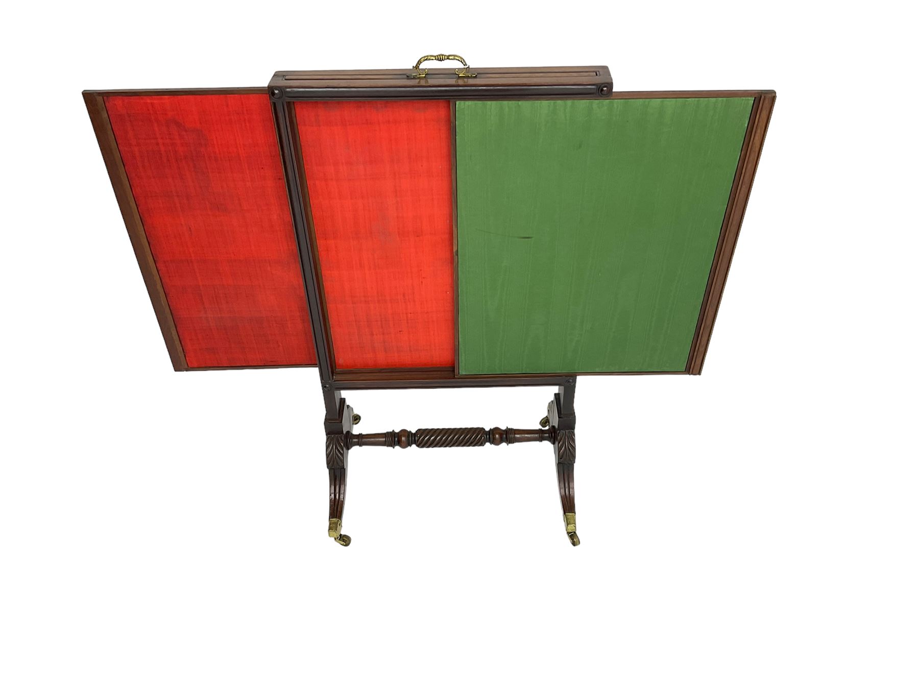 Regency mahogany screen with two horizontal and one vertical pull-out panels, on base with carved sabre legs and rope-twist stretcher