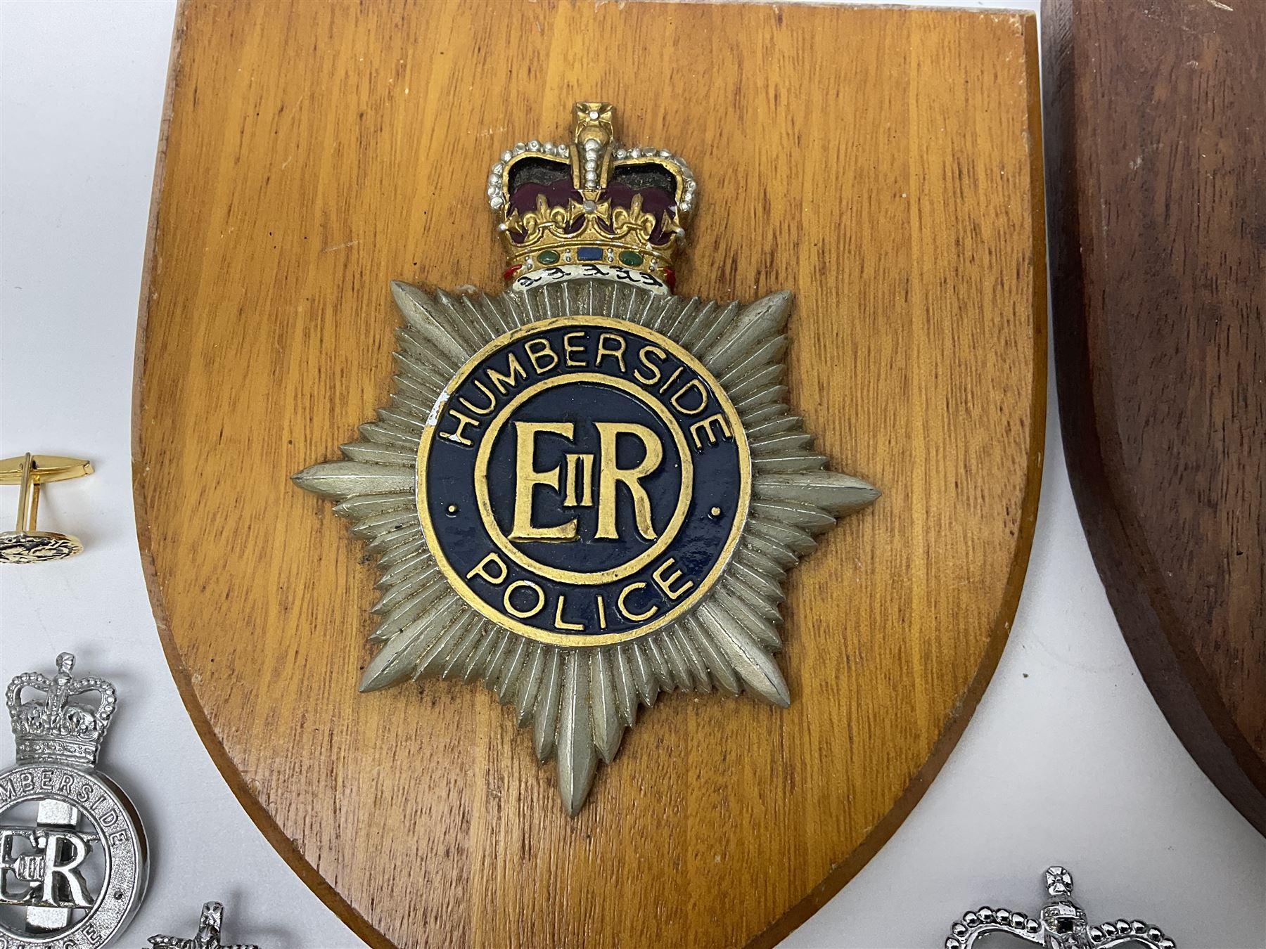 Police - large quantity of cap and collar badges, collar numbers and buttons for Hull City Police, Humberside Police, Lincolnshire Constabulary, York & North East Yorks Police etc; all queen's crown; and three helmet plates including one king's crown