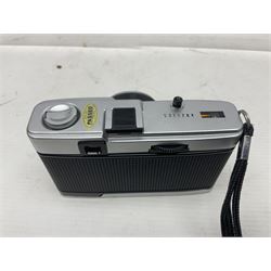 Four Olympus camera bodies, including Olympus OM10, serial no 20744269, with 'Olympus OM-System Zuiko Auto-S 50mm 1:1.8' lens serial no 3633644, Olympus OM-2 camera body serial no 460280 with 'Olympus OM-System G.Zuiko Auto-s 1:1.4 f=50mm' lens, serial no 729750, etc 