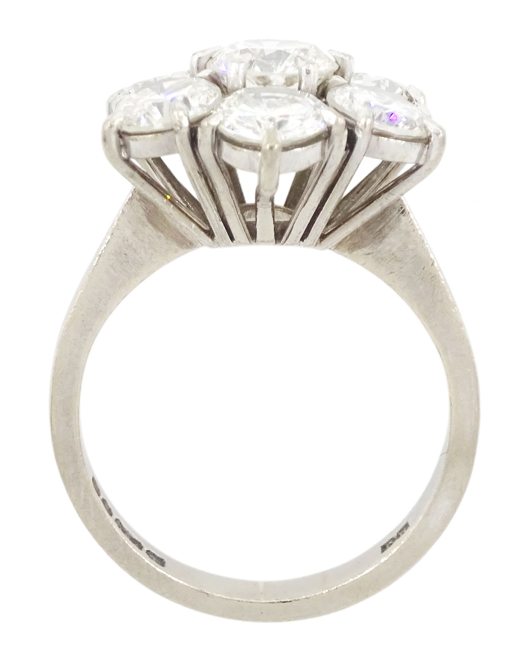 18ct white gold seven stone round brilliant cut diamond flower head cluster ring, London 1977, principal diamond approx 0.75, total diamond weight approx 3.15 carat