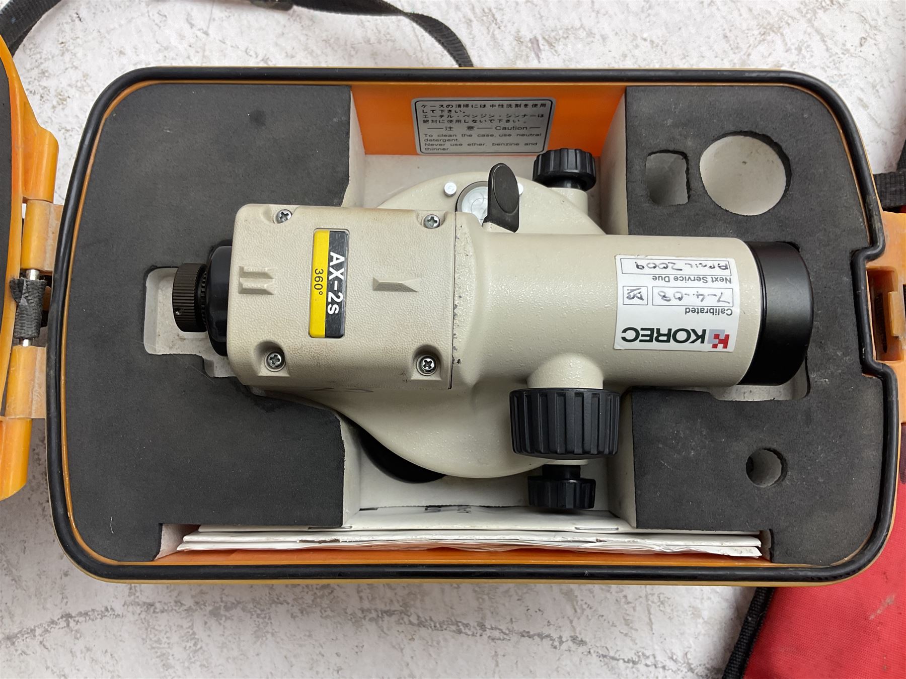 Land Surveying equipment - Nikon AX-2s Automatic Level 360 degrees, serial no.810890; in carrying case with instructions; Nikon Electronic Distancemaster Prism; in carrying case; Imax B6AC Dual Power Professional Balance Charger/Discharger; in carrying bag; Omni Zero 