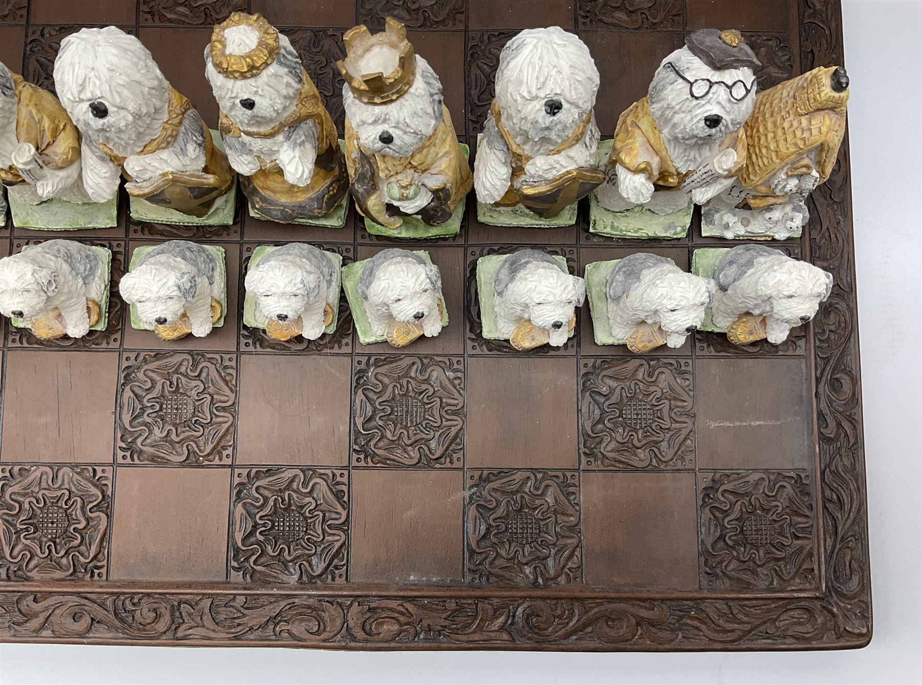 A Sylvia Smith chess set, the pieces modelled as anthropomorphic Old English Sheepdogs