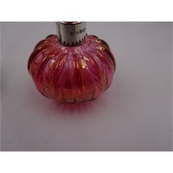 Modern novelty silver tape measure, in the form of a pig, hallmarked CME Jewellery Ltd, together with a silver mounted pink glass scent bottle, signed H. White to base, with silver collar hallmarked Laurence R Watson & Co, Birmingham 1996, scent bottle H12cm