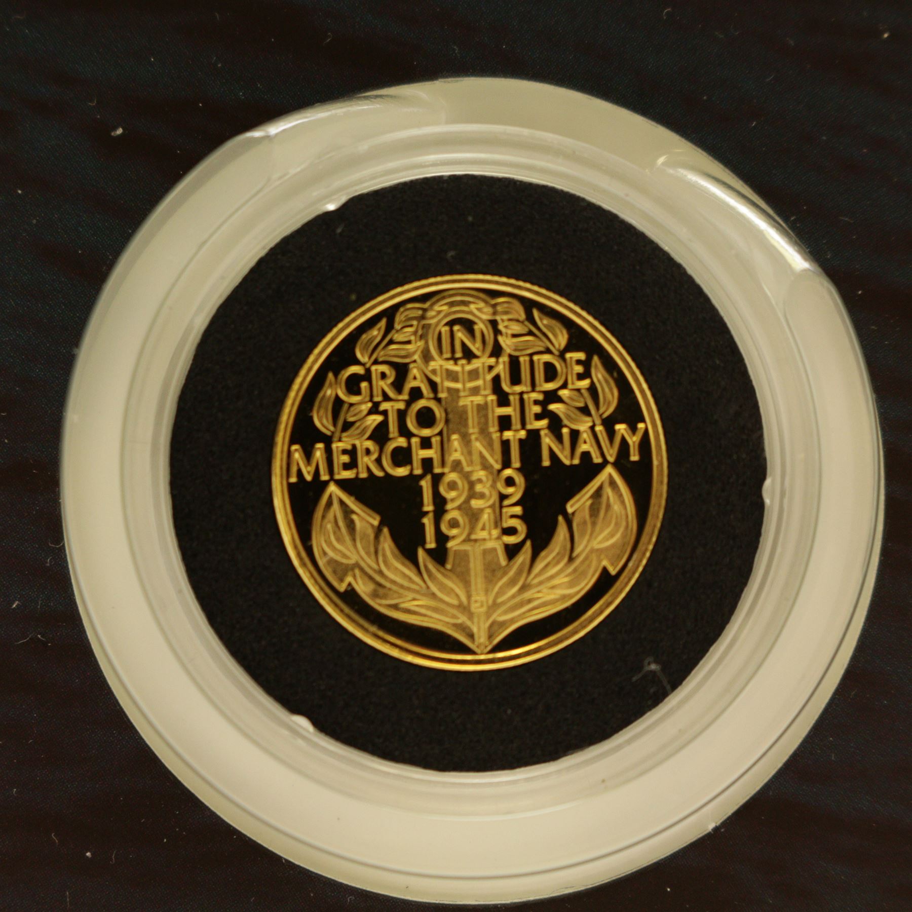 Merchant Navy 'The Battle Of The Atlantic 1939-1945', part coin set including Queen Elizabeth II Gibraltar 2016 24 carat gold 3.11 grams ten pound coin etc, in card folder