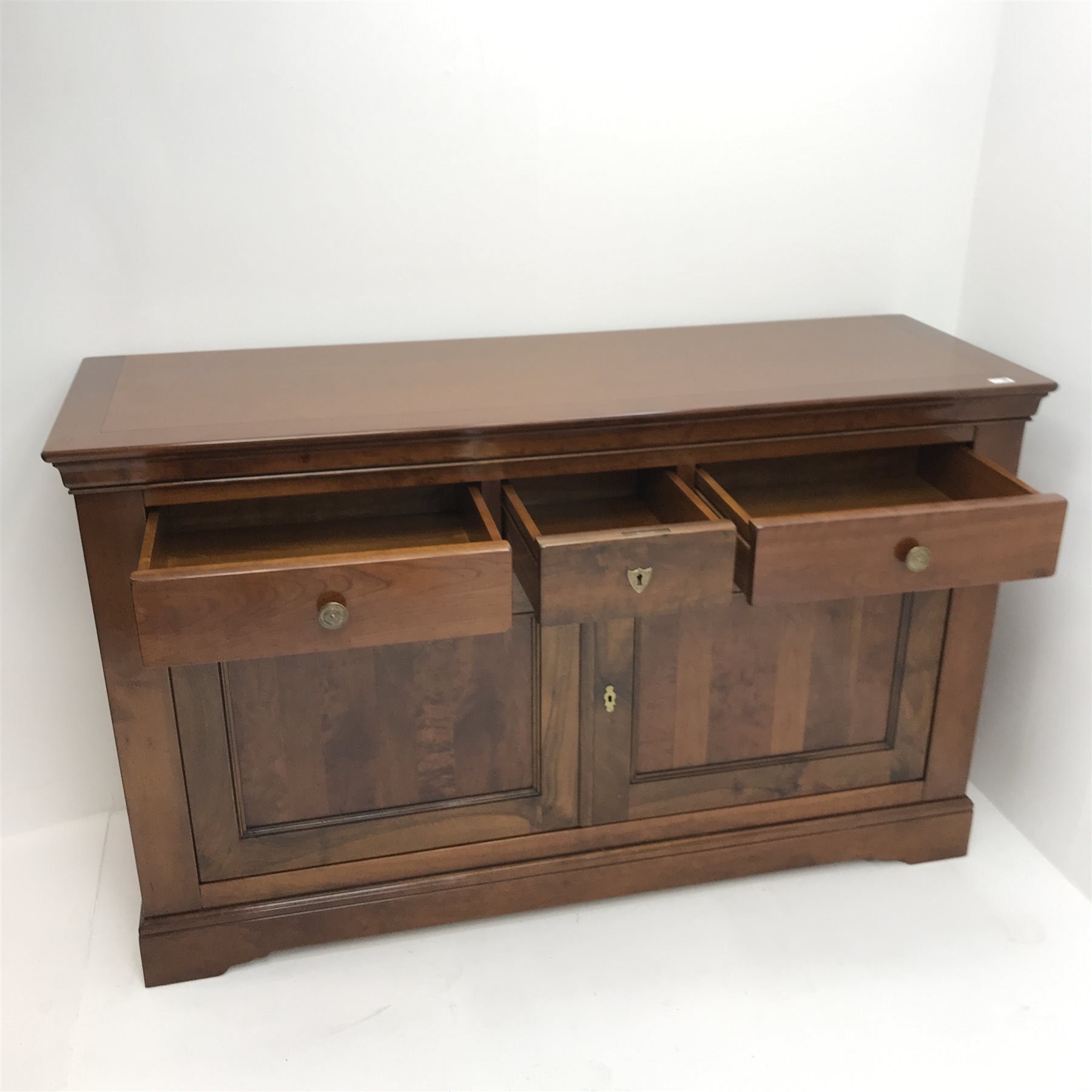 Grange cherrywood sideboard, one long and two short drawers above two cupboards, shaped platform base, W159cm, H97cm, D53cm