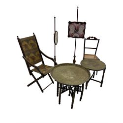 Folding campaign chair with Elephant upholstery; two mahogany pole screens with upholstery panels; two brass top folding benares tables; mahogany side chair with cane seat