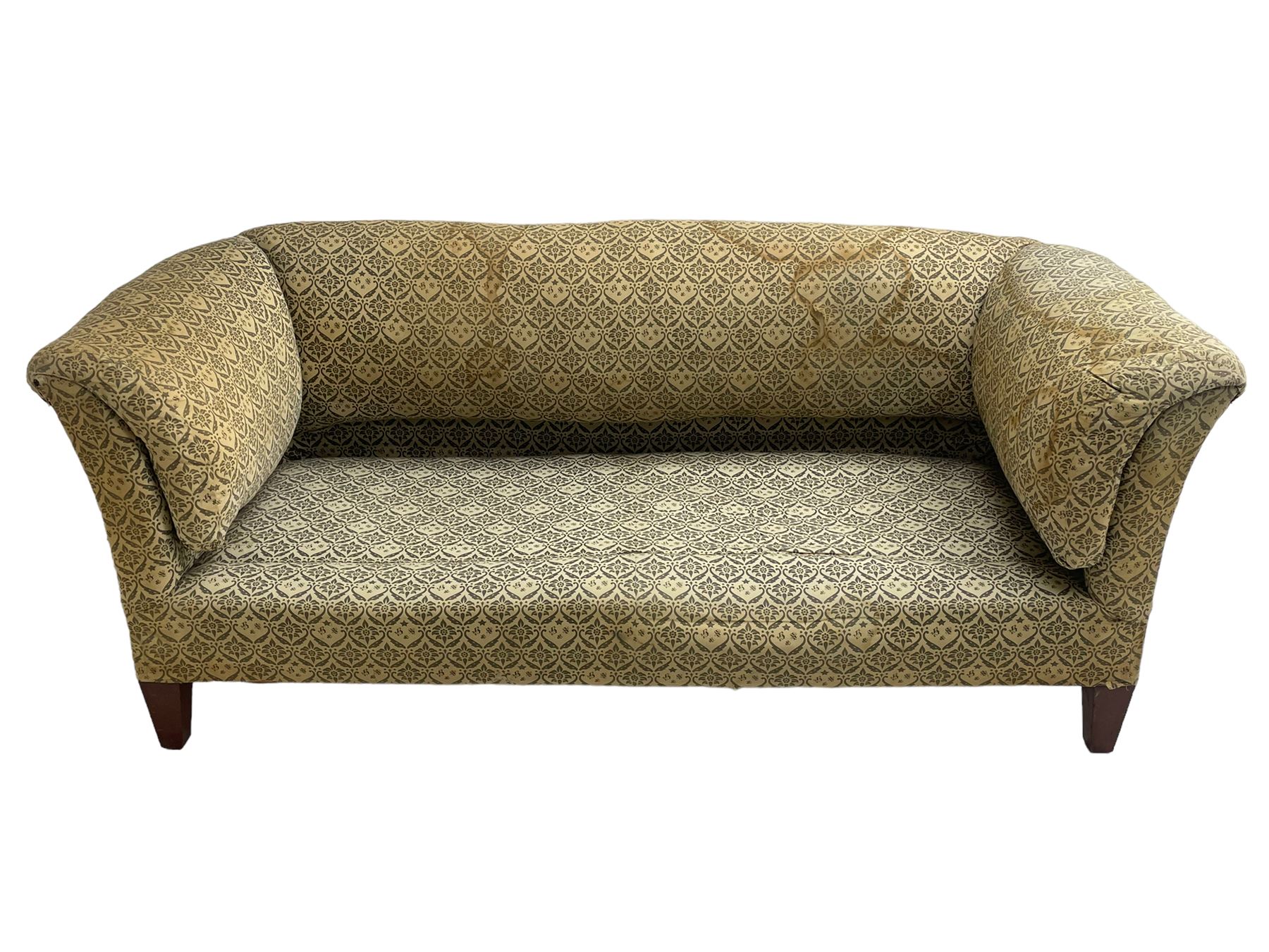 Howard & Sons - Edwardian mahogany framed two seat sofa, upholstered in original H&S foliate patterned fabric with sprung seat and overstuffed back and arms, raised on square tapering supports, the rear leg stamped '19600 1795 Howard & Sons Ltd Berners Street'