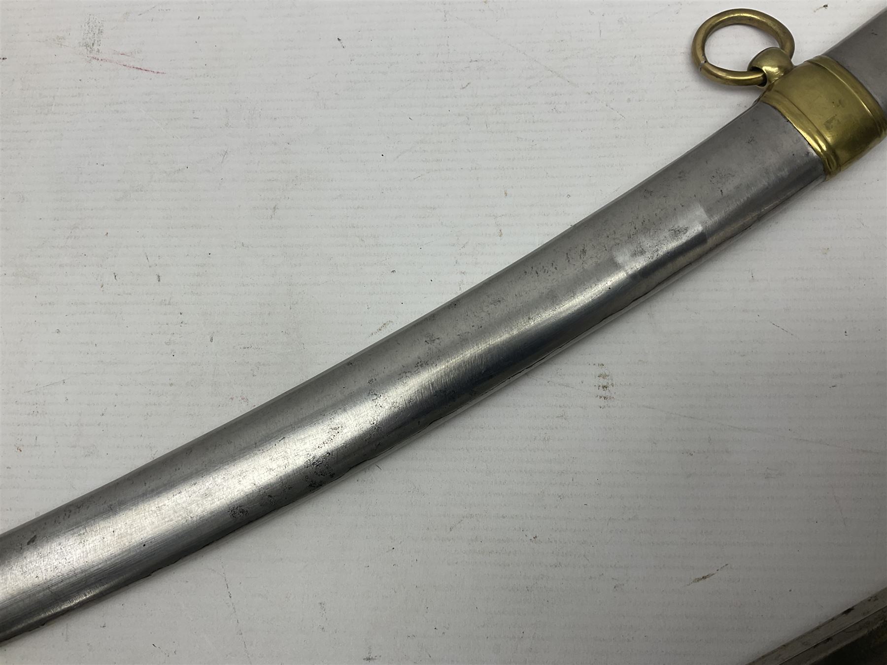 Early 19th century French Lancers officer's sword c1810, the 84cm curving fullered blade retaining most of its bluing, gilding and engraved decoration, inscribed I.S.& C. to ricasso (for Schimelbusch), brass three-bar hilt with elongated elliptical langets and wire-bound leather grip; in polished steel scabbard with two brass suspension rings L100cm overall