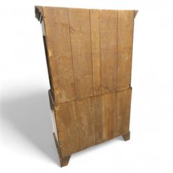 Mid 18th century oak tallboy chest, the projecting cavetto-moulded cornice over two short and three long drawers to the upper section, the lower section with three further graduated long drawers, each drawer with oak linings and fitted with later brass swan-neck handles, flanked by stop-fluted quarter columns, all raised on shaped bracket feet