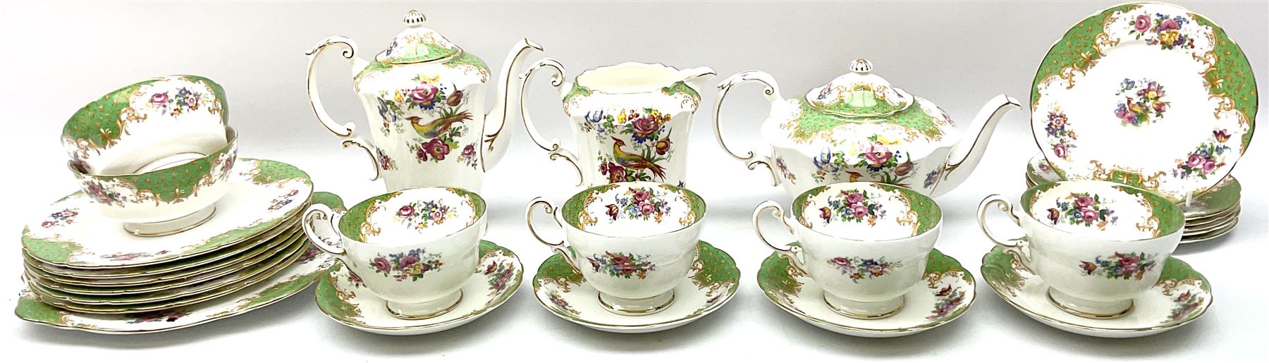 Paragon Rockingham pattern tea set, comprising teapot, coffee pot, four teacups and four saucers, six side plates, six dessert plates, cake plate, two open sucriers, and jug. 