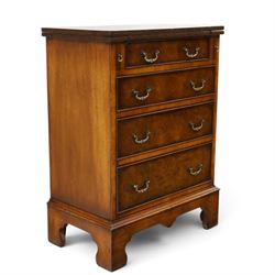 Reprodux - Georgian design figured and burr walnut bachelors chest, rectangular hinged-fold over top with reeded edge supported by stays, over four long graduating cock-beaded drawers, lower moulded edge on bracket feet