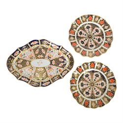 Royal Crown Derby imari patter 1128, two plates with fluted rim, together with Royal Crown...