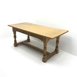 Light oak refectory style dining table, baluster supports joined by floor stretchers, W184cm, H77cm, D81cm