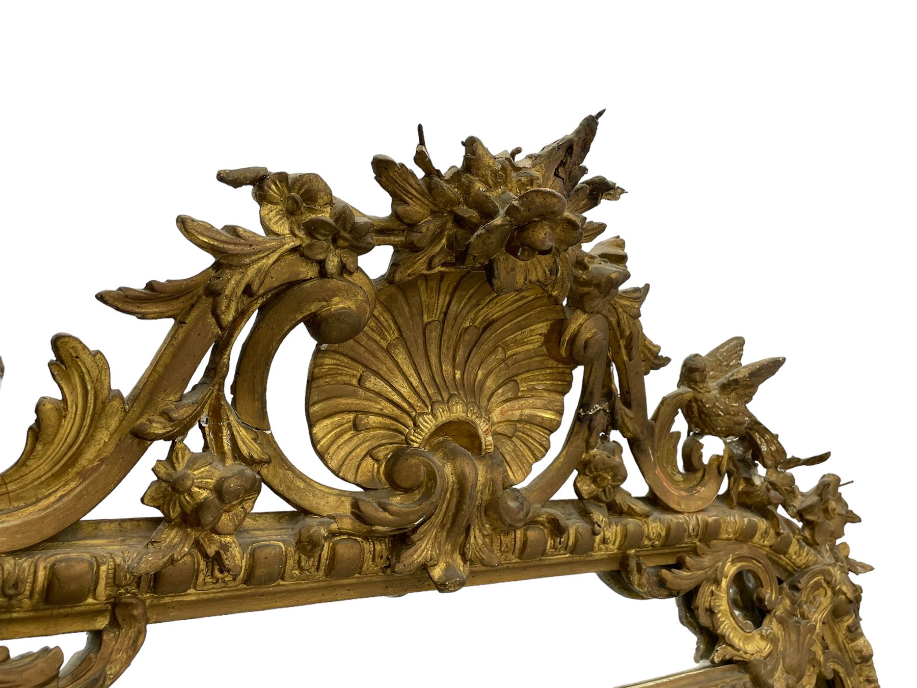 19th century giltwood and gesso pier mirror, shell cartouche pediment decorated with flower heads and scrolling foliage, two bird motifs to each side, egg and dart moulded frame with beaded inner slip, plain mirror plate, each corner mounted by scrolled acanthus leaves and cartouches