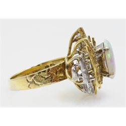  Single stone opal ring, set in yellow and white gold abstract bark mount stamped K14  