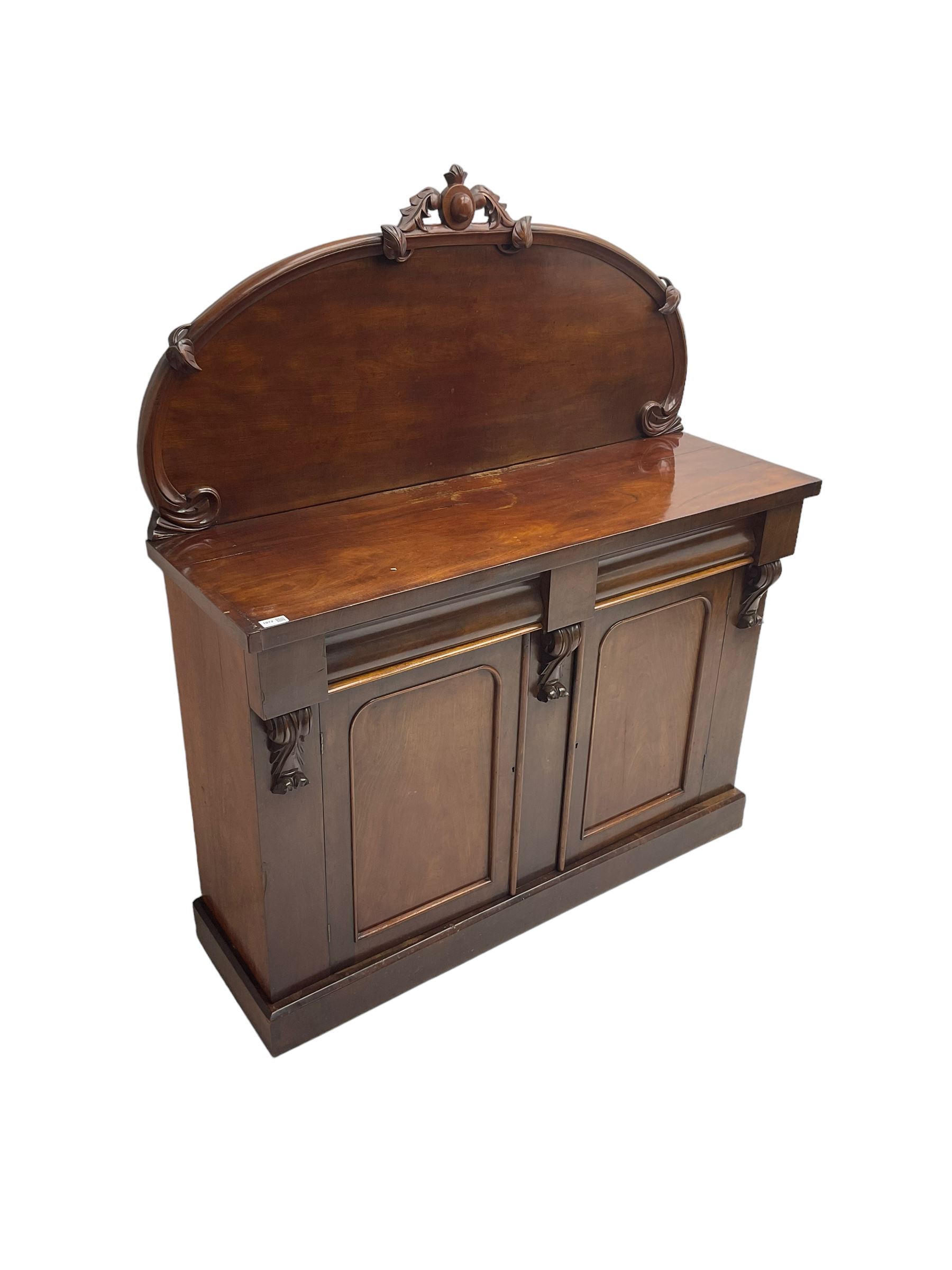 Victorian mahogany chiffonier sideboard, raised back with central cartouche pediment, fitted with two two drawers over two panelled cupboards, flanked by foliate corbels