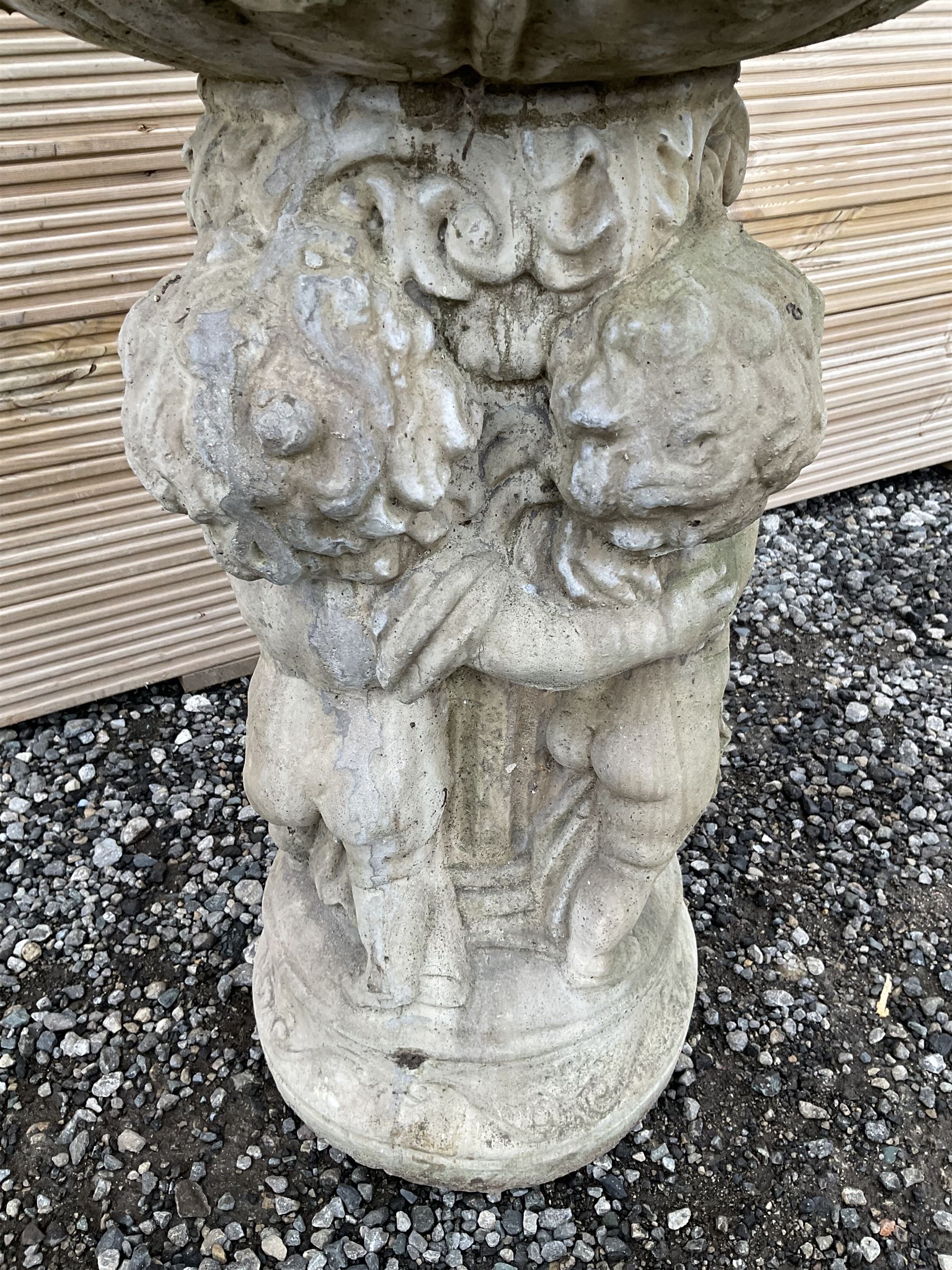 Cast stone planter or bird bath, supported by classical putti on circular base - THIS LOT IS TO BE COLLECTED BY APPOINTMENT FROM DUGGLEBY STORAGE, GREAT HILL, EASTFIELD, SCARBOROUGH, YO11 3TX