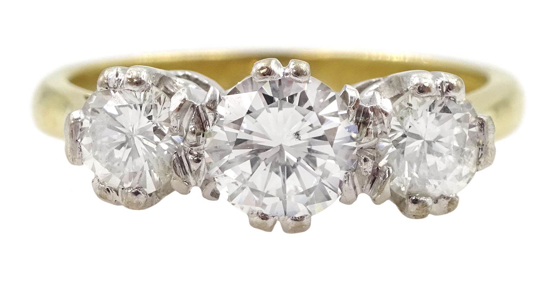 18ct gold three stone round brilliant cut diamond ring, London 1976, total diamond weight approx 1.20 carat