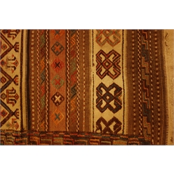  Persian red ground saddlebag, field with stepped medallions, another with repeating geometric stripes, 118cm x 68cm (2)  