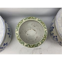 Pair of Chinese blue and white jardinieres, decorated with birds perched upon branches with key fret border to rim, H23cm D30cm, together with a smaller jardiniere decorated with green foliage, H17cm