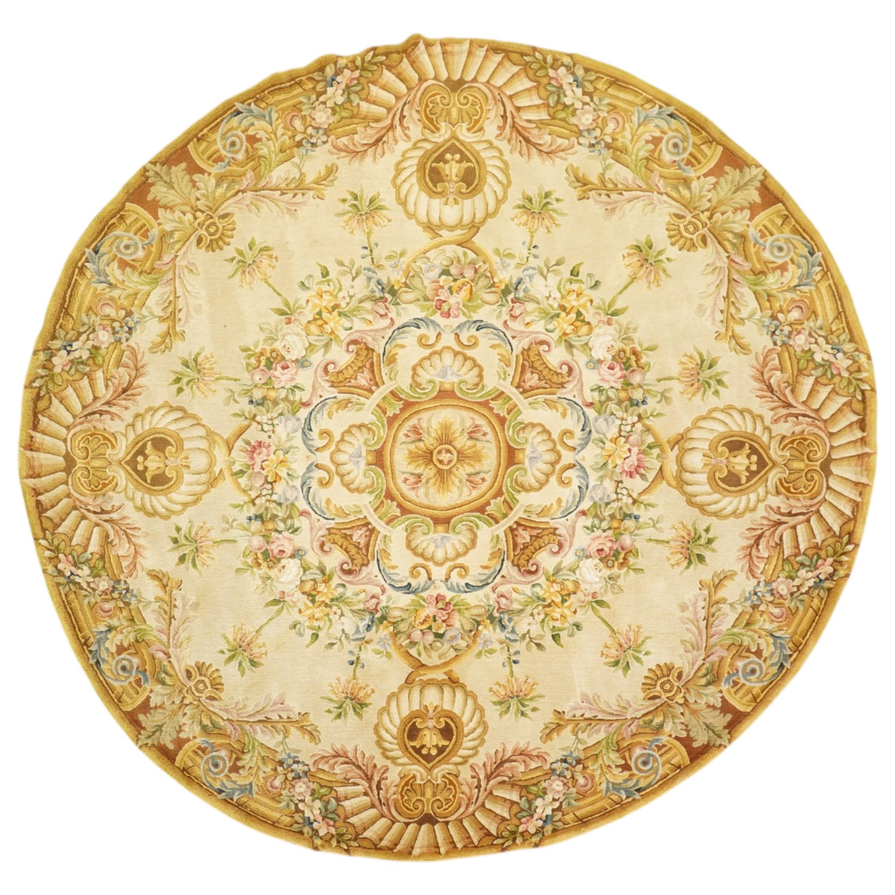 20th century French Aubusson style circular carpet, cream ground of Savonnerie design with scrolling floral and scallop motifs