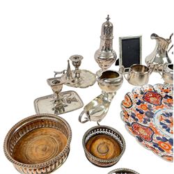 Silver plated items, including thee pairs of bottle coasters, sugar caster, Elkington jug, chamberstick etc and a Japanese Imari scalloped charger