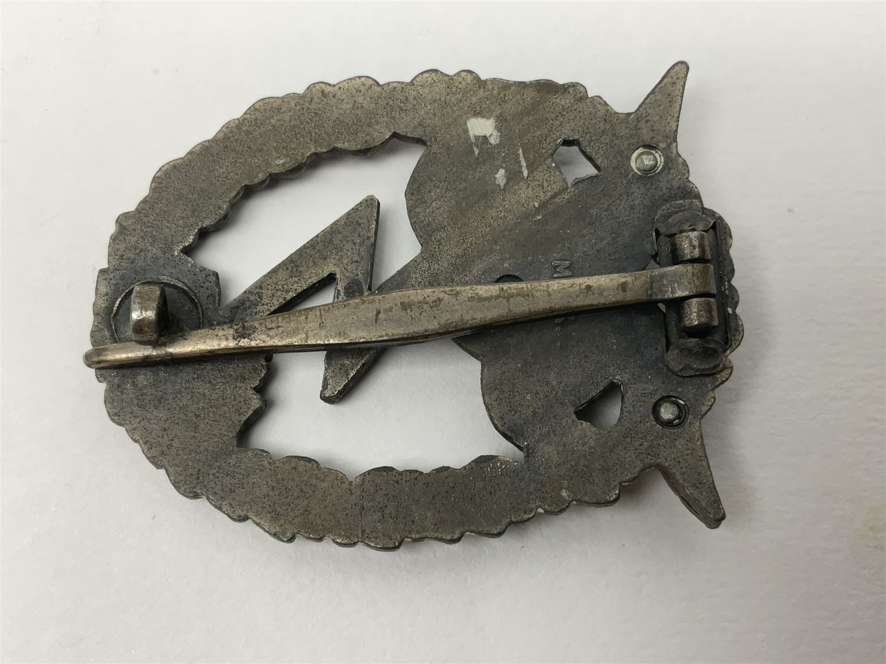 Two WW2 German Luftwaffe Ground Assault/Combat badges - one with flat pin and maker's mark M.u.K.; the other unmarked with round pin (2)