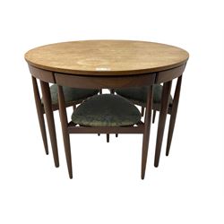 Hans Olsen for Frem Røjle - mid-20th century Danish teak 'Roundette' dining set, comprising a circular dining table raised on four tapering supports, paired with four matching chairs, each with a triangular seat upholstered in floral patterned fabric and raised on three tapering supports