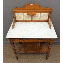  Edwardian marble top washstand, raised tiled back, single drawer, metal towel rail to the side, turned supports joined by an undertier with a cupboard enclosing a shelf, W87cm, H110cm, D45cm  