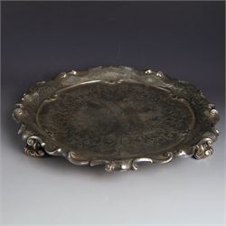 Victorian silver waiter, of circular form with fluted scrolling rim and engraved floral an...