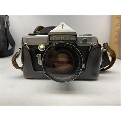Petri FT 35mm SLR camera with a Petri 1:1.8 55mm lens, Petri Flex camera with a Petri 1:2 55mm Kuribayashi lens, together with cases and quantity of lenses etc