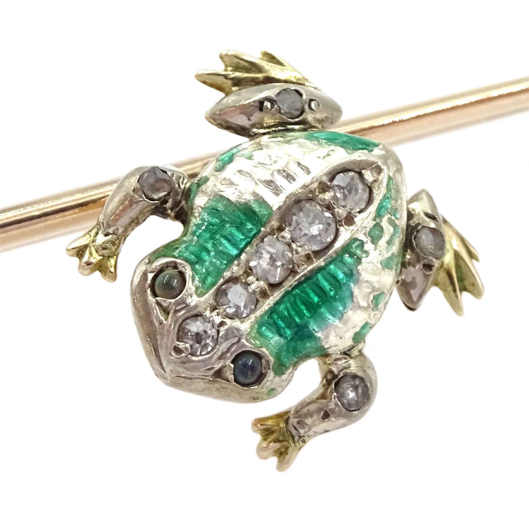 Edwardian frog and spear brooch, the gold and silver green enamel spinning frog set with old cut diamonds and stone set eyes, sat on a gold spear, with registered design number Rd 364025