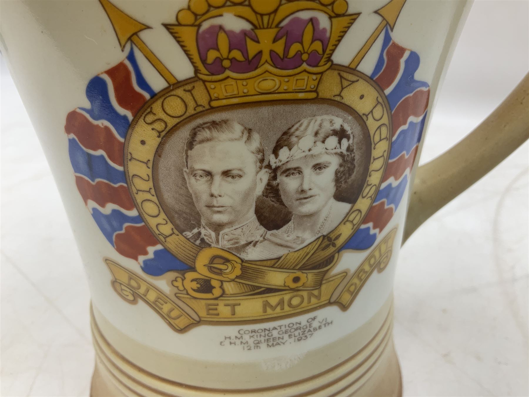 Shelley musical pottery jug commemorating the 1937 Coronation of King George VI, with printed mark beneath, H20cm