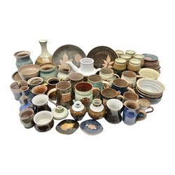 Wold studio pottery tankards, in various colours and relief decoration together with other studio items including vases, jugs and pots 
