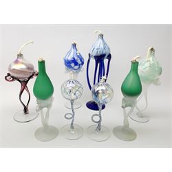 Pair of Art glass oil lamps on sinuous glass supports, together with six other art glass oil lamps of similar style, possibly by Krosno, tallest H31cm (8)