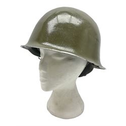 1950s French Algerian War steel helmet with liner; indistinctly marked 'S.I.A. LE EANS(?) 71R'