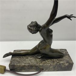 1930s Art Deco spelter table lamp, modelled as a nude woman holding aloft a spherical crizzled glass shade, upon a marble base, H48cm