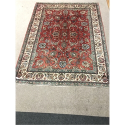 Persian Tabriz red ground carpet, central medallion, repeating border, 355cm x 270cm