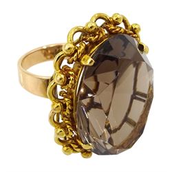 14ct gold single stone large oval smokey quartz ring, stamped