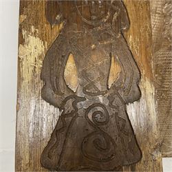 Two 20th century hardwood Dutch folk art Speculaasplank or biscuit moulds, typically carved with figures in traditional dress, largest H101cm