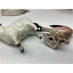 Group of Beswick figures to include leopard no 1082, rabbits, swan, pheasant no 1226 etc, all with marks beneath