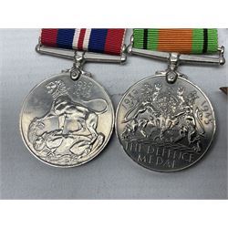 WW2 group of four medals comprising 1939-1945 War Medal, Defence Medal, Italy Star and 1939-1945 Star; with Royal Army Service Corps cap badge and RASC chrome and enamel sweetheart brooch