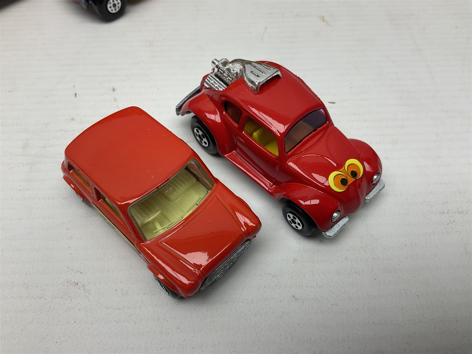 Matchbox 1-75 Series 'Superfast' ex-shop stock - eight models comprising 22d Freeman Intercity Commuter, 23e Volkswagen Camper, 29d Racing Mini, 30d Beach Buggy, 32d Maserati Bora, 34d Formula 1 Racing Car, 36d Hot Rod Draguar and 40d Vauxhall Gildsman 1; all boxed; and an unboxed 31d Volksdragon (9)