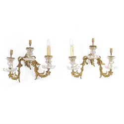 Early 20th century pair of Rococo revival twin branch wall lights, cast brass foliate scro...