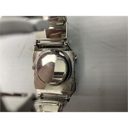 Four X Data stainless steel wristwatches, two Marc Gay wristwatches and one other, all with cover plates