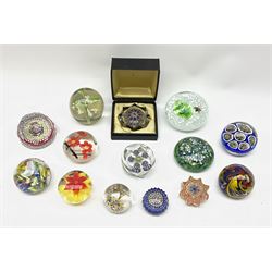 A group of paperweights, mostly Millefiori examples, to include Strathearn example in unassociated presentation box, Muano example, and a number of other examples with internal 'floral' decoration. (14). 