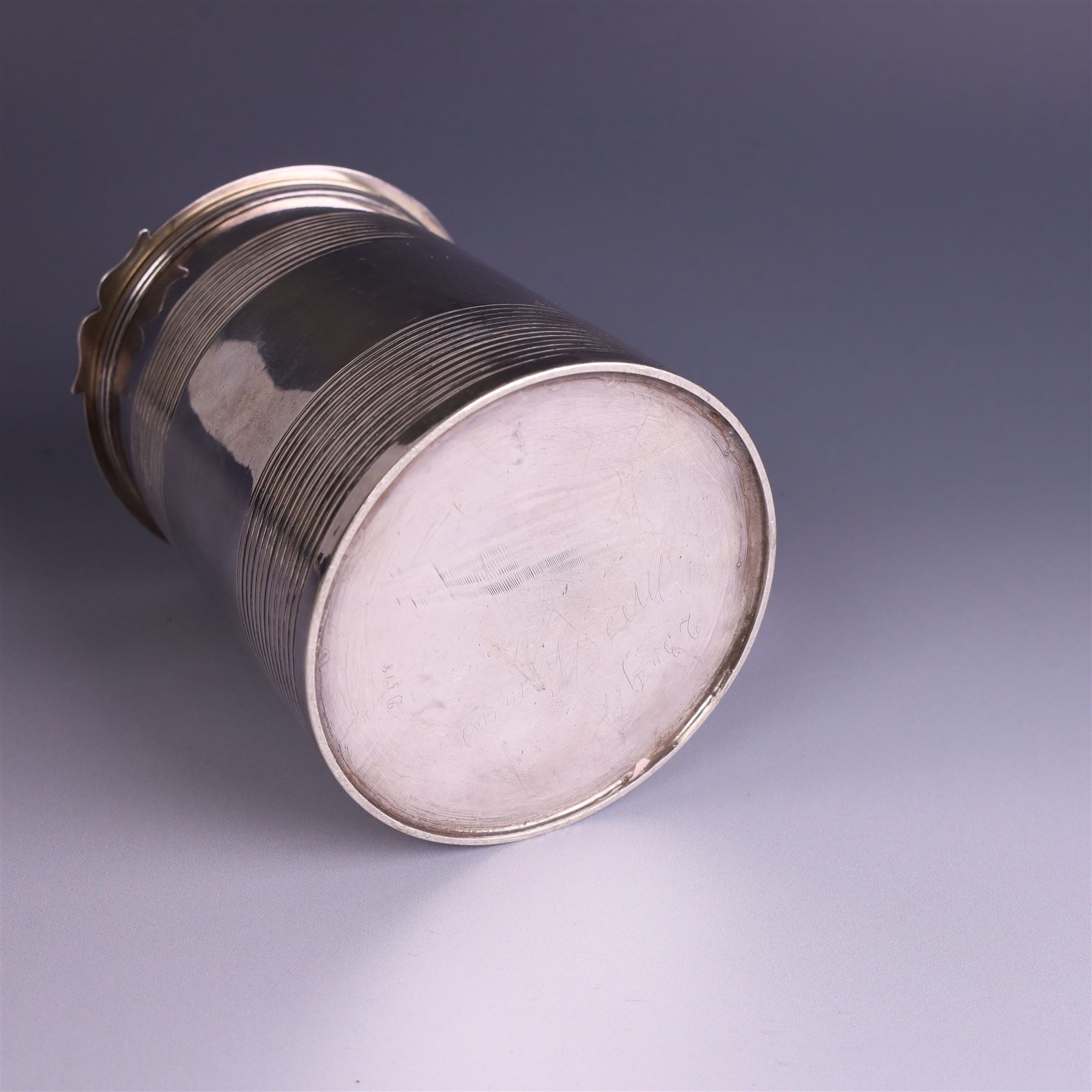 George III silver lidded tankard, with two ribbed bands to the cylindrical body, the hinged lid with concentric circle to cover and pierced thumbpiece, hallmarked Charles Fox I, London 1816, including thumb piece H16cm