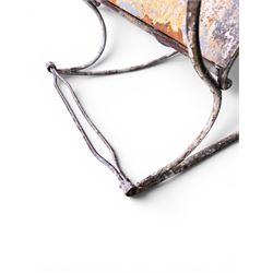 Pair of large unusual 19th century wrought iron garden rocking chairs, simple scroll design, lacking canvas seat